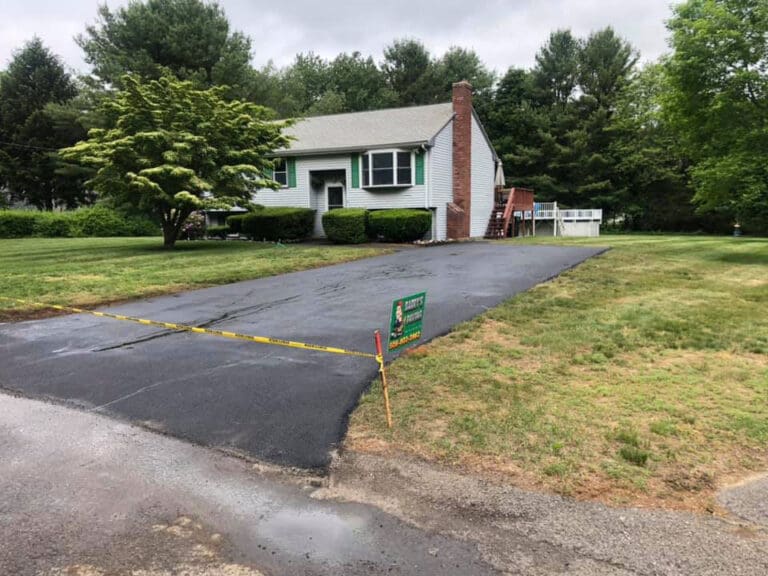 Driveway and pathway after being paved by Barry's Paving & Sealcoating