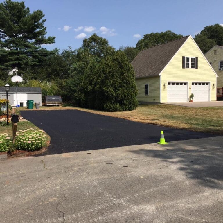 Driveway after being paved by Barry's Paving & Sealcoating