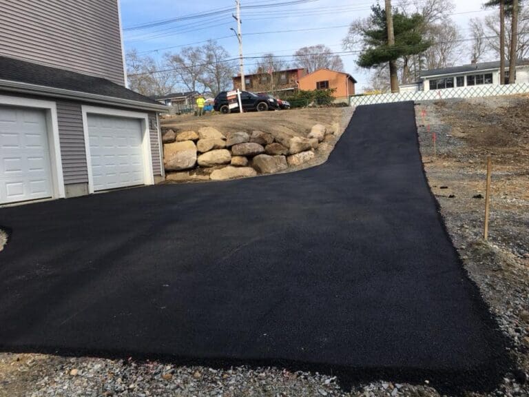 Driveway after being paved by Barry's Paving & Sealcoating